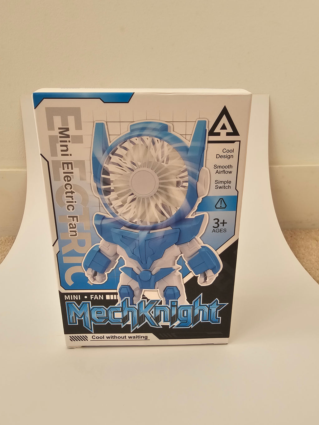 A futuristic robot-style handheld fan
