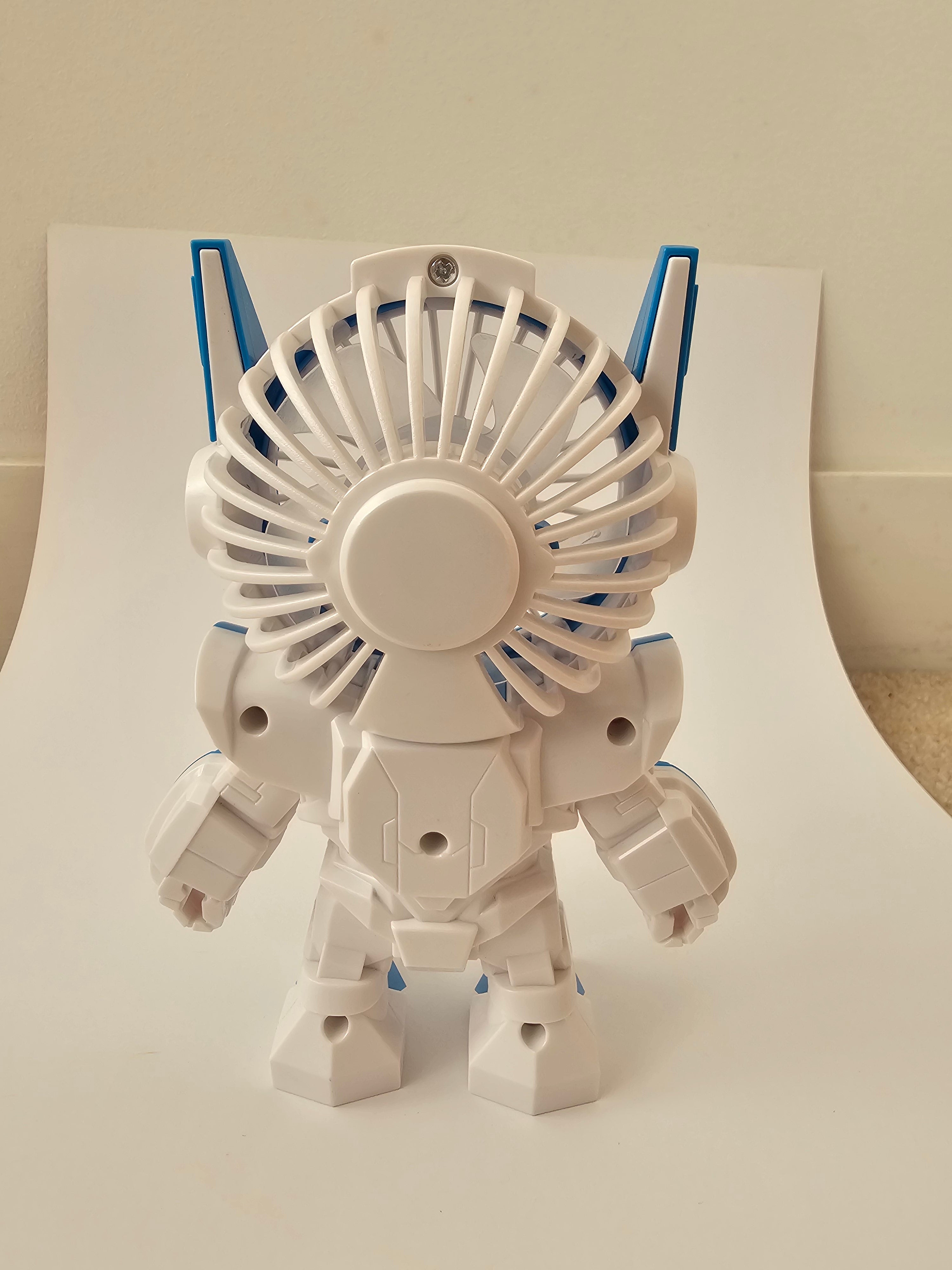 A futuristic robot-style handheld fan